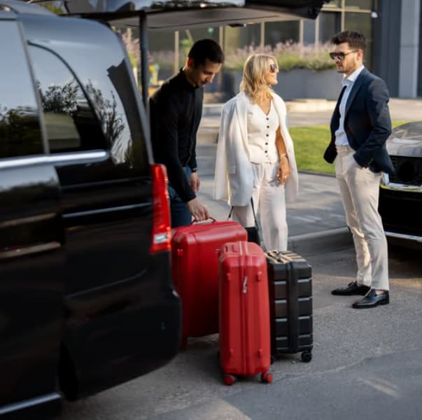 Group with luggage boarding an SUV — Chicago group airport transportation